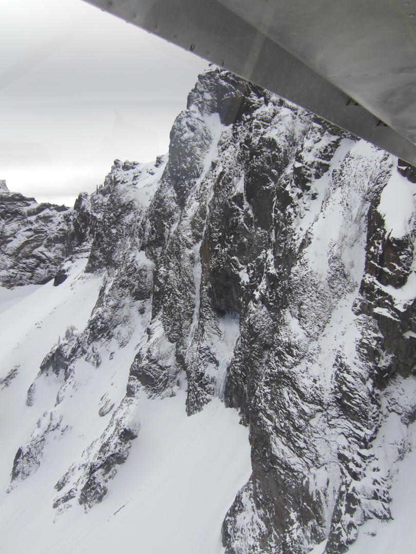 The east face of Mt. Thielsen, seen on an aerial reconnaissance prior to the successful climb. Brainless Child tackles the obvious snow and ice gully in the center of the photo.  