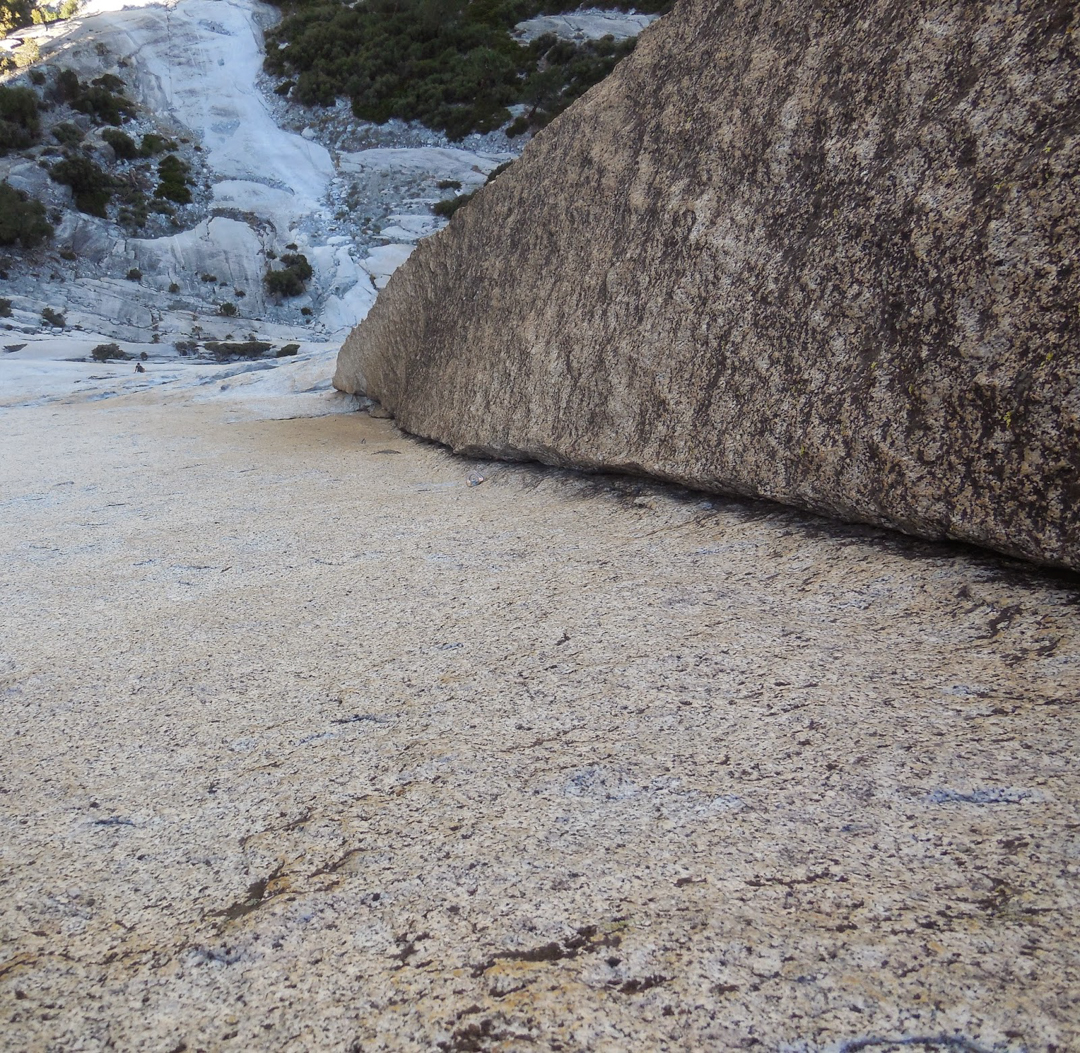 Looking down pitch 5 of the Emperor, a 5.11c enduro layback/stem corner. 