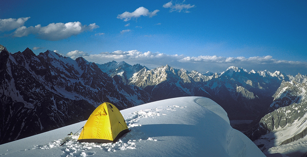 Peter Thompson’s camp at 5,080m on the northeast ridge of Peak 6,315m, looking east-northeast to peaks on the north side of the upper Batura Glacier.  