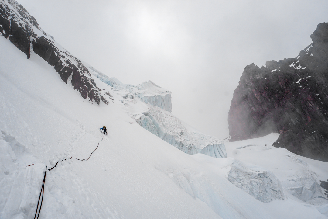 Derek Field leading the first belayed pitch on the southwest face of Chilpariti. 