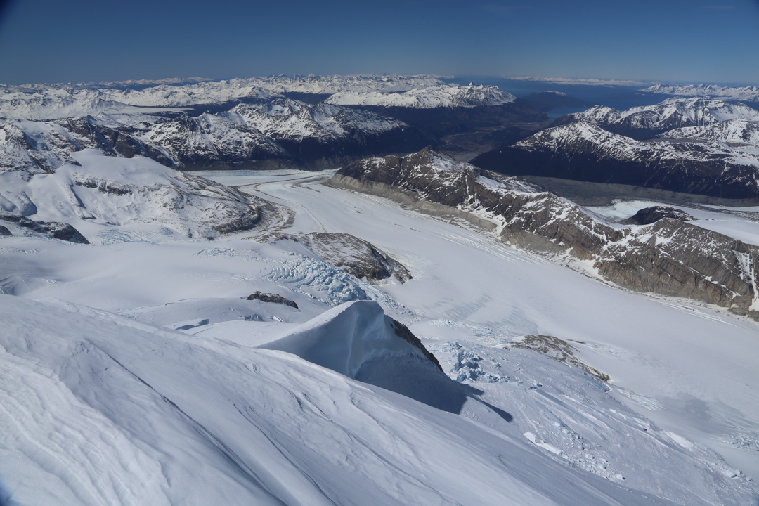 View from the summit of Cerro Stoppani, looking down the Yandegaia Valley, Stoppani Glacier, and Armada de Chile Glacier. 