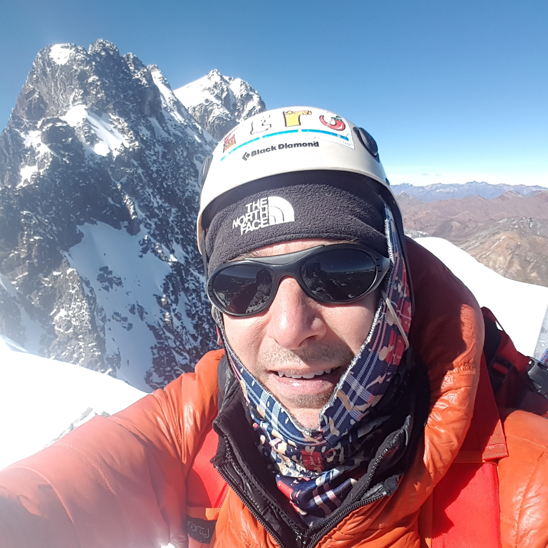 Steve Meder on the summit of Rajuntay Norte (ca 5,400m), with Rajuntay behind.