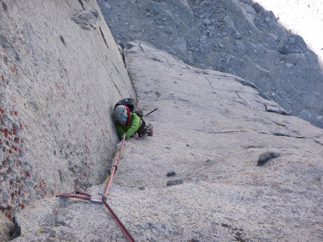 Giselle Field jams to the top of the second pitch (5.10b) of Crocks ’n’ Socks (1,200’, 11 pitches, IV 5.11a) on the north pillar of Mt. Crocker (12,457’).