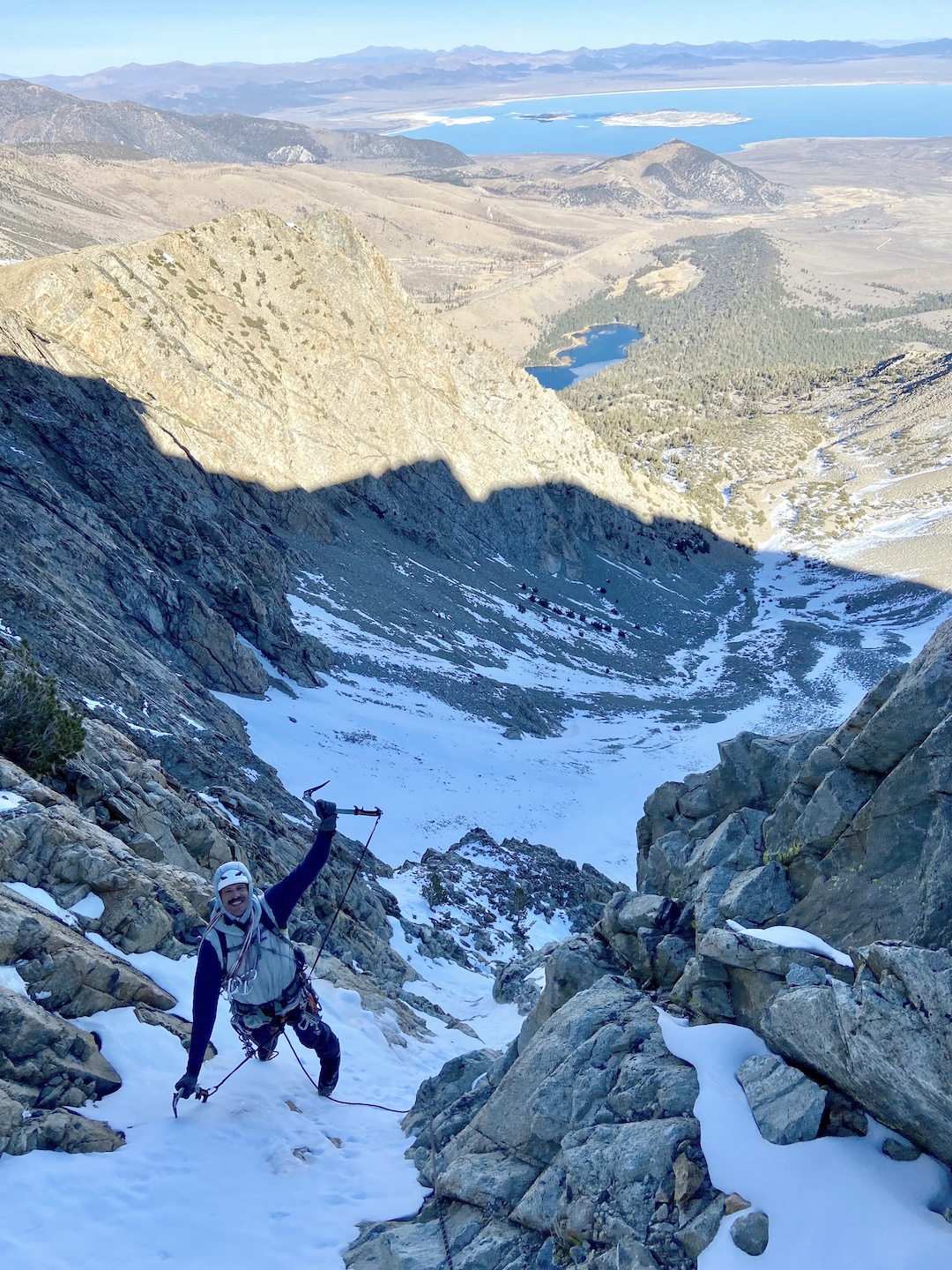 Tad McCrea enjoying the endless styrofoam climbing on Sacrificial Dread, east face of Mt. Lewis.