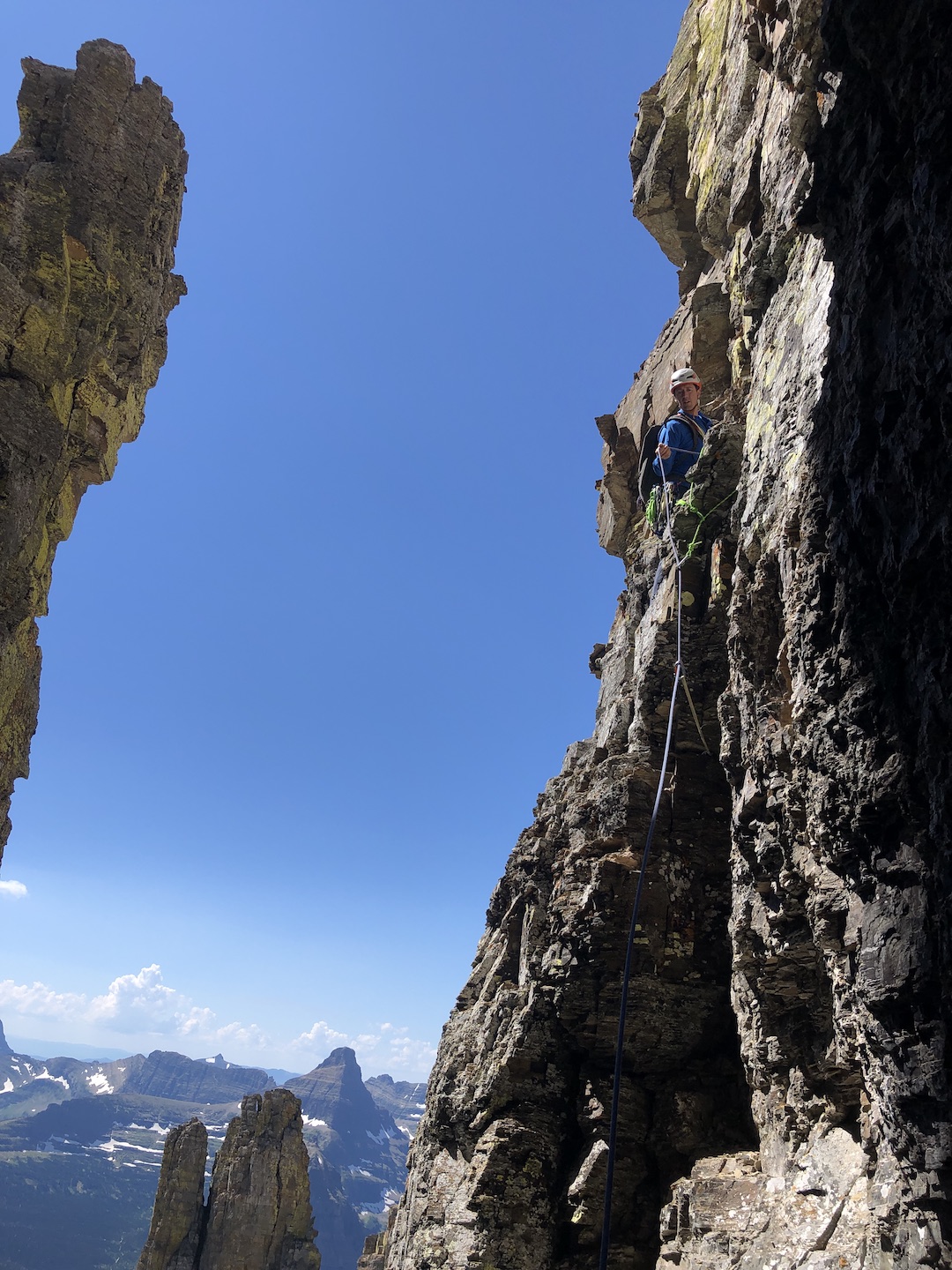 Stefan Beattie leads out of the upper chimney on the south face (4,500’, IV 5.7) of Going-to-the-Sun Mountain. 