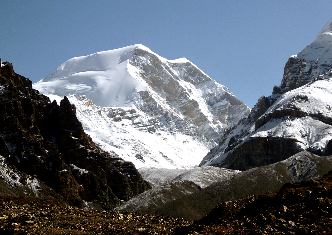 Khumjungar from the south. The 2023 route of ascent climbed the obvious snow face from an upper glacier (hidden), reached from the northwest. The summit is the high point at the top right of this face.  