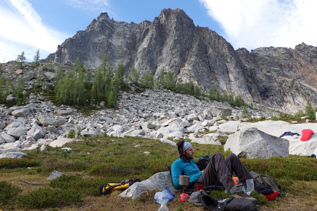 Sean Reckert at the bivy below the north face of Castle Peak on the morning after his and Spencer Gray’s first ascent of Ripped Settee (1,200’, 5.12a A0). 