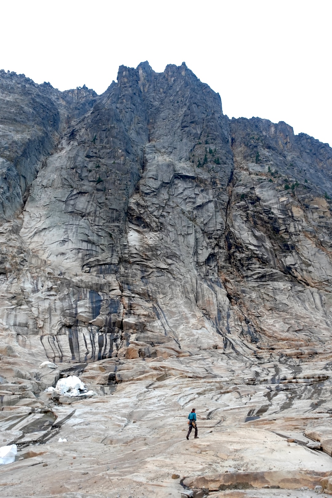 Sean Reckert approaching the central buttress of the north face of Castle Peak.