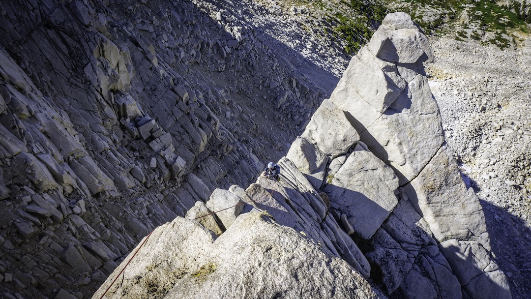 Dan Wolfskill following the final arête pitch to the summit of Moonrise Spire during the first ascent of Disco Scouts (625’, 6 pitches, 5.11a).