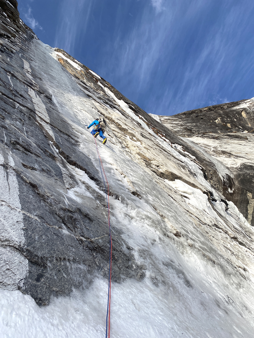 Pat Perry Johnson climbing the thin ice smear that formed the crux of the new route on the northeast face of Tengkangpoche.