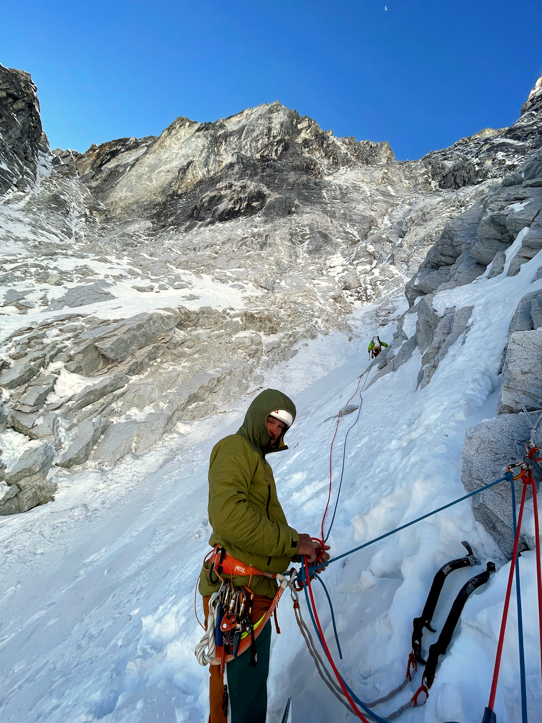 Mathieu Stephan belays Jérémy Fino low on the north face of Langdak during the first ascent of Bande Organisée.