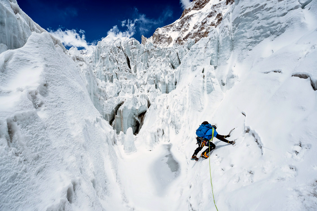 Negotiating the glacier below the west face of Hungchi.