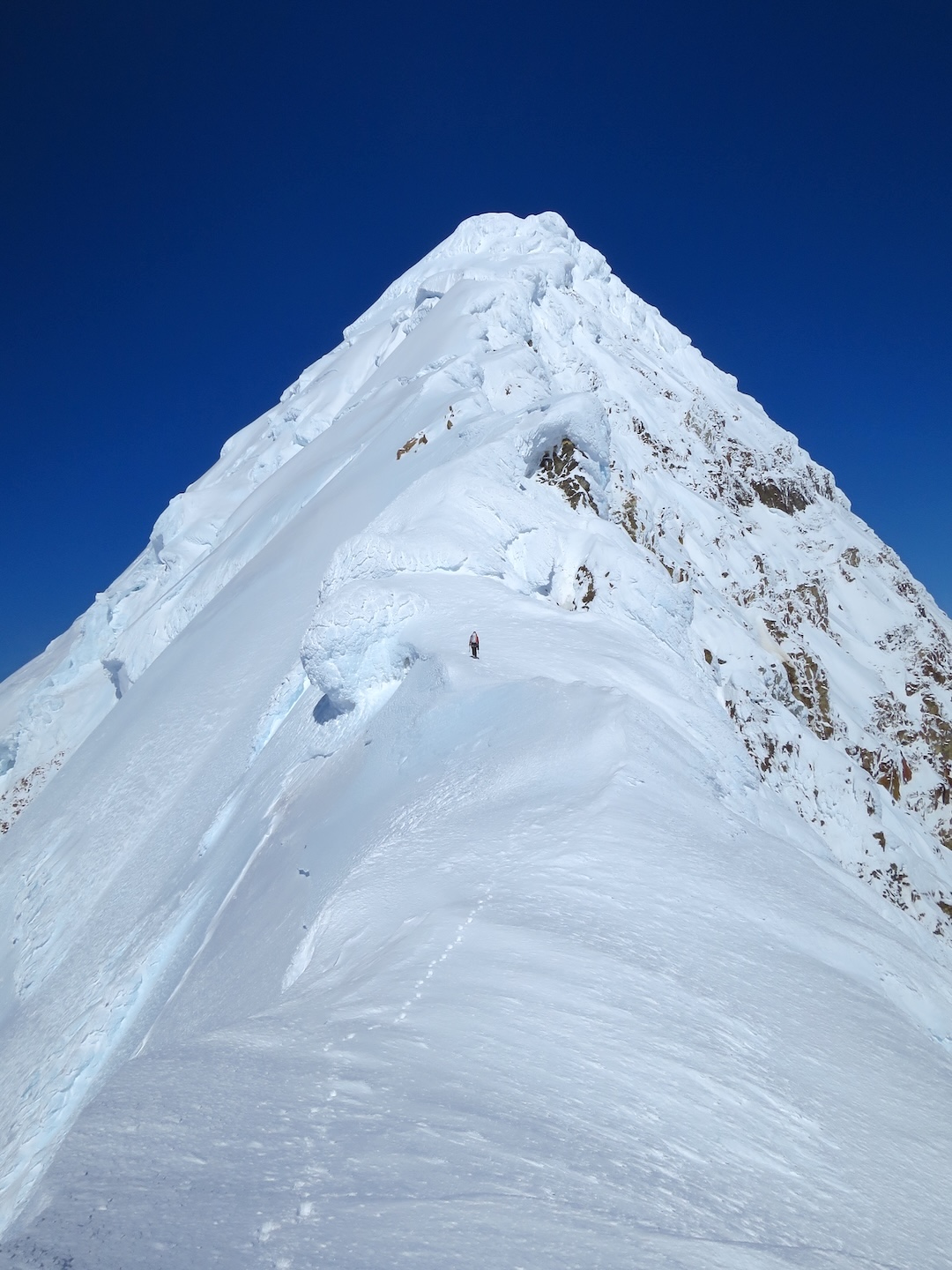 Sam Hennessey makes his way up the south ridge toward the summit of Mt. Russell.