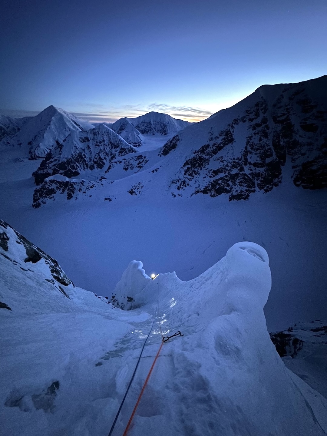 Dane Steadman following the “Dragon’s Spine” ice arête to the junction with the French Route on his and Cody Winckler’s successful second attempt to climb In the Shadow of the Wall on the north buttress of Begguya. 