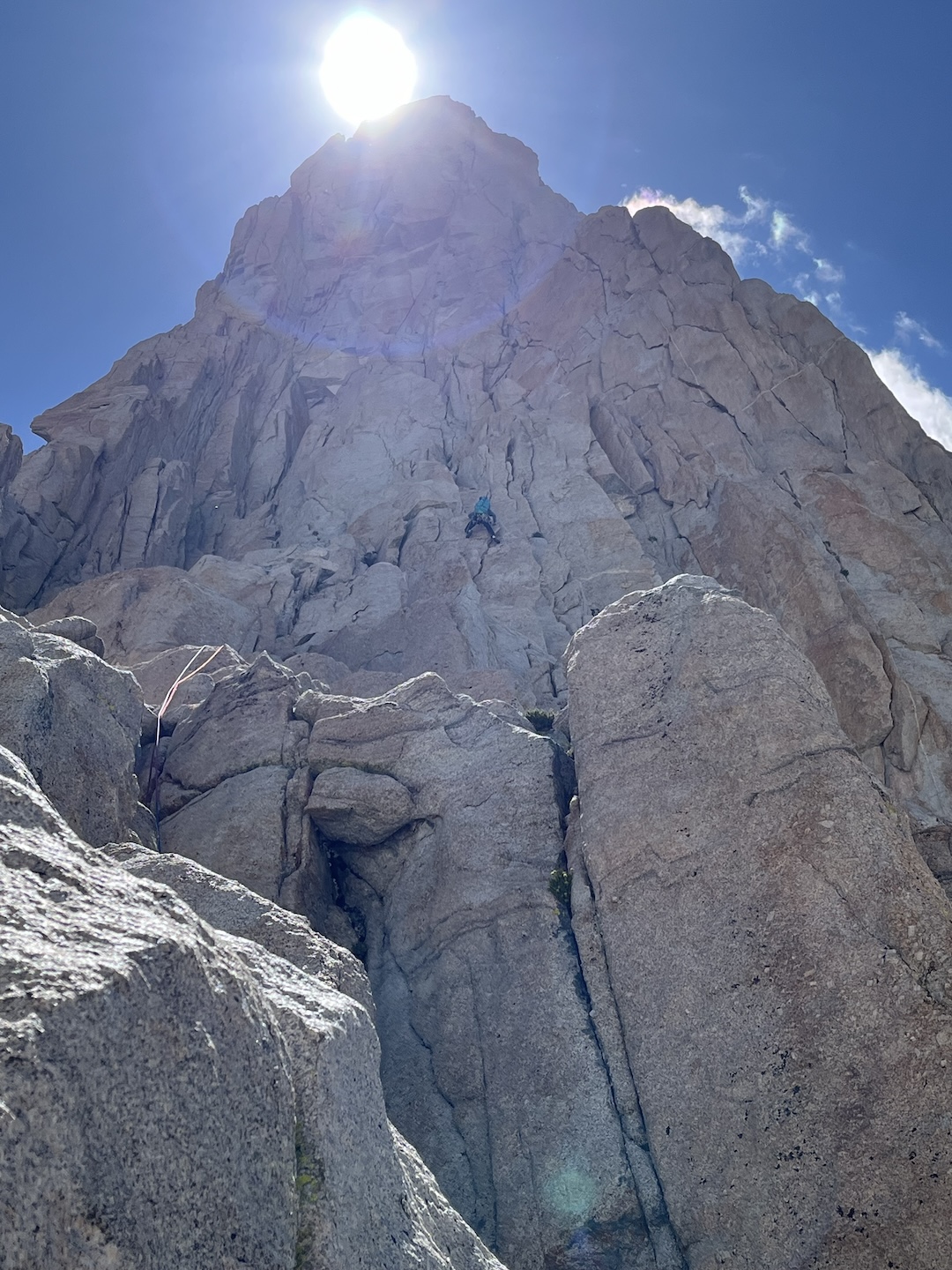 Honz Mikhalek nearing the headwall with the sun about to drop behind the formation on Shadow of a Doubt, Mt. Hitchcock, the Sierra. 