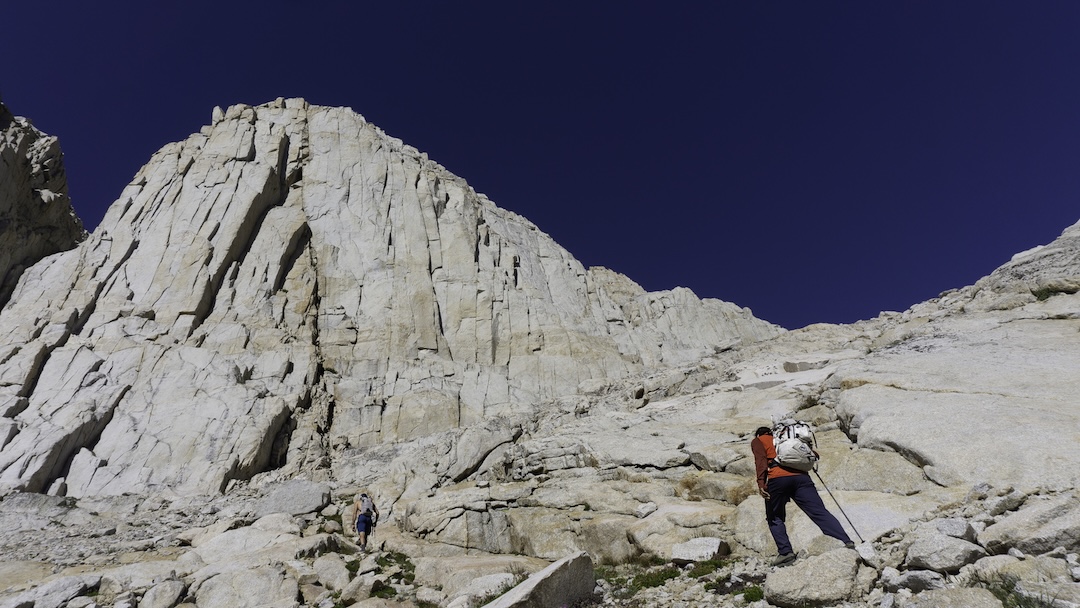 Japhy Dhungana (right) and Rainbow Weinstock approaching Sky Blue Diamond in Sky Blue Lake Basin, Sierra Nevada, California. Together with Zach Lovell, they made the first known ascent of the formation via a route called Altared State (900’, 5.12a).