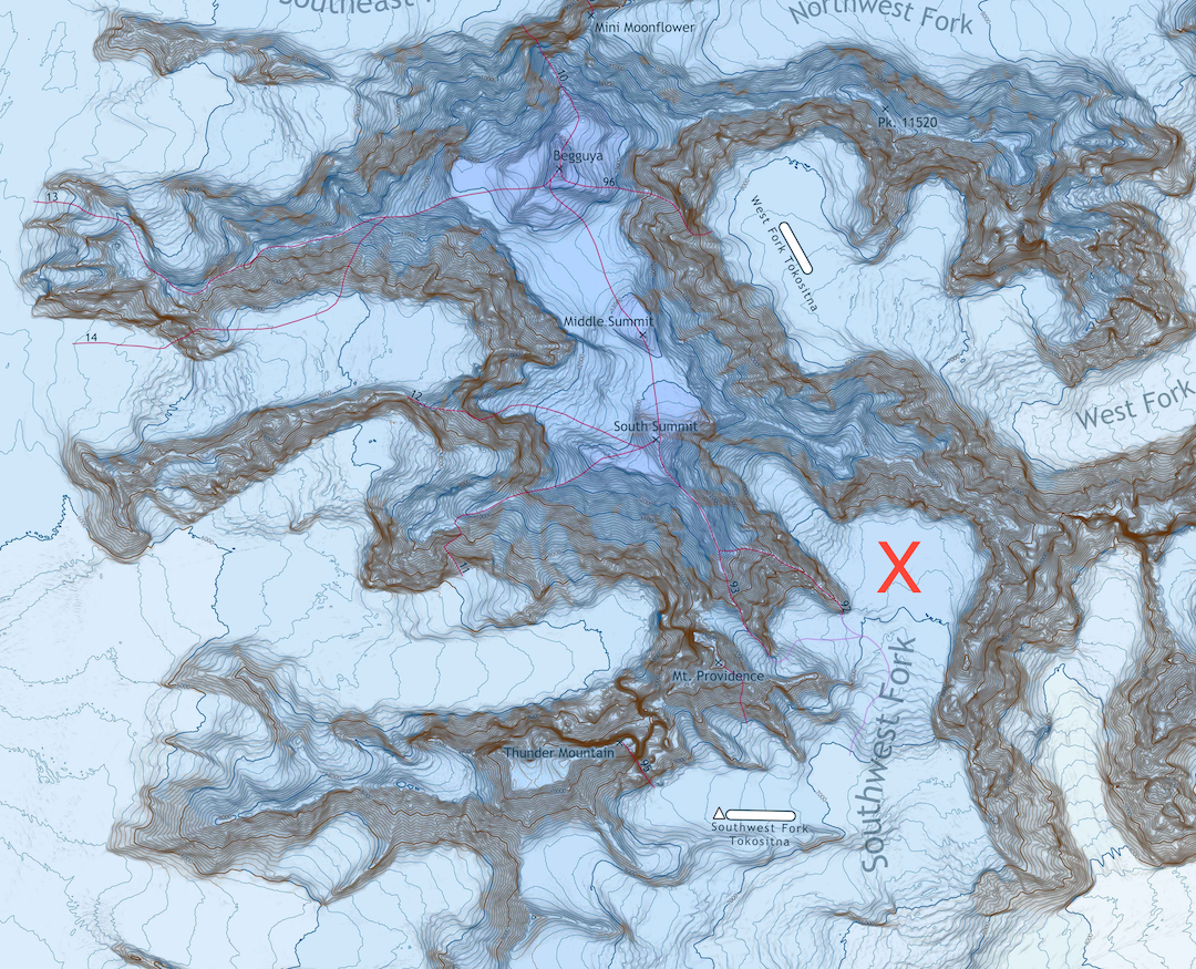 The landing zone where Paul Roderick dropped off Ben Dewey and Chris Dewey below the Southeast Spur of Begguya. After bailing off that route due to poor snow conditions, the pair made the first ascent of a summit they named the Water Tower, the highest of four points on the north-south ridge forming the eastern border of the cirque below the Southeast Spur of Begguya. 