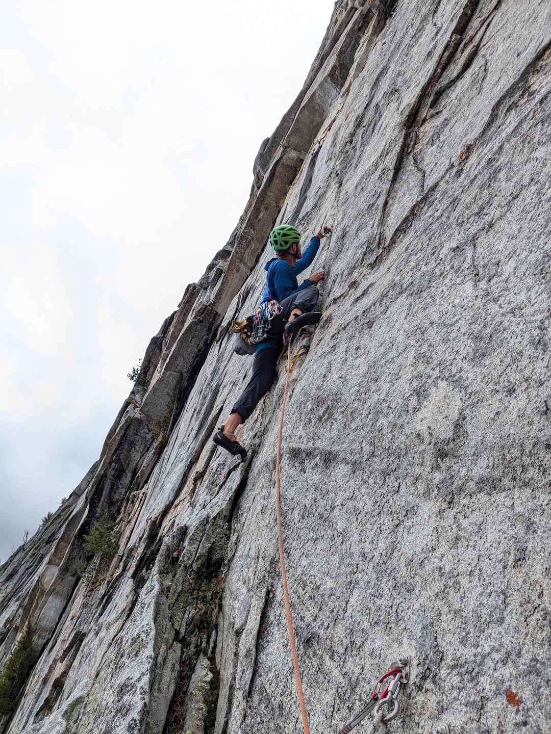 Michal Matyjasik starting up pitch one on Pika Paradise (200m, 7 pitches, IV 5.13b) on Storm Dome. 
