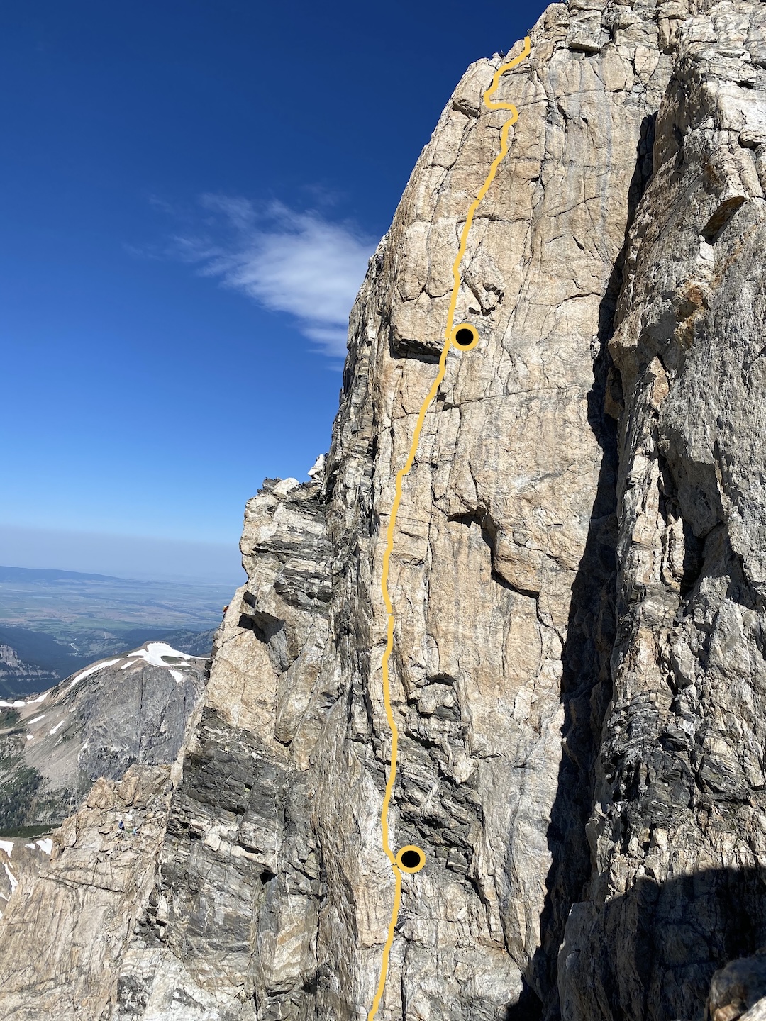 The line of Wish You Were Here (III 5.10-) on the Grand Teton. 
