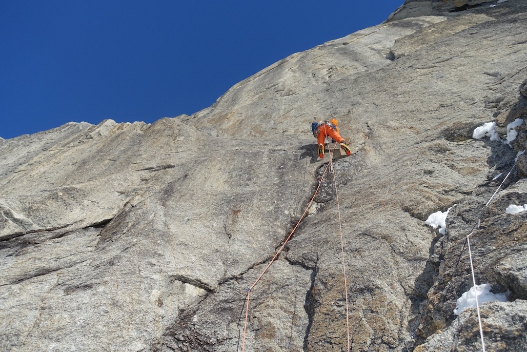 Tom Livingstone aiding through a steep section on day two near the start of The Great Wall (1,500m) on the south face of Mt. Dickey, Ruth Gorge, Alaska Range, Alaska.