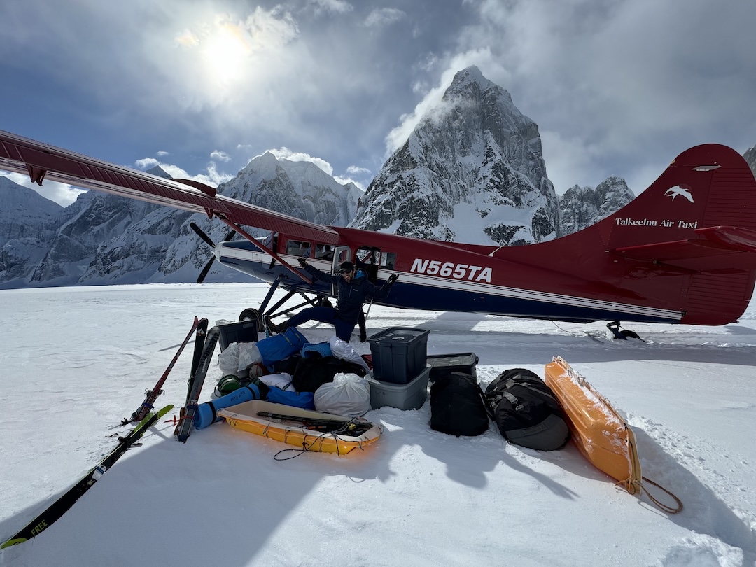 Michael Telstad psyched to be on the Ruth Glacier. Mt. Bradley is directly behind the plane.