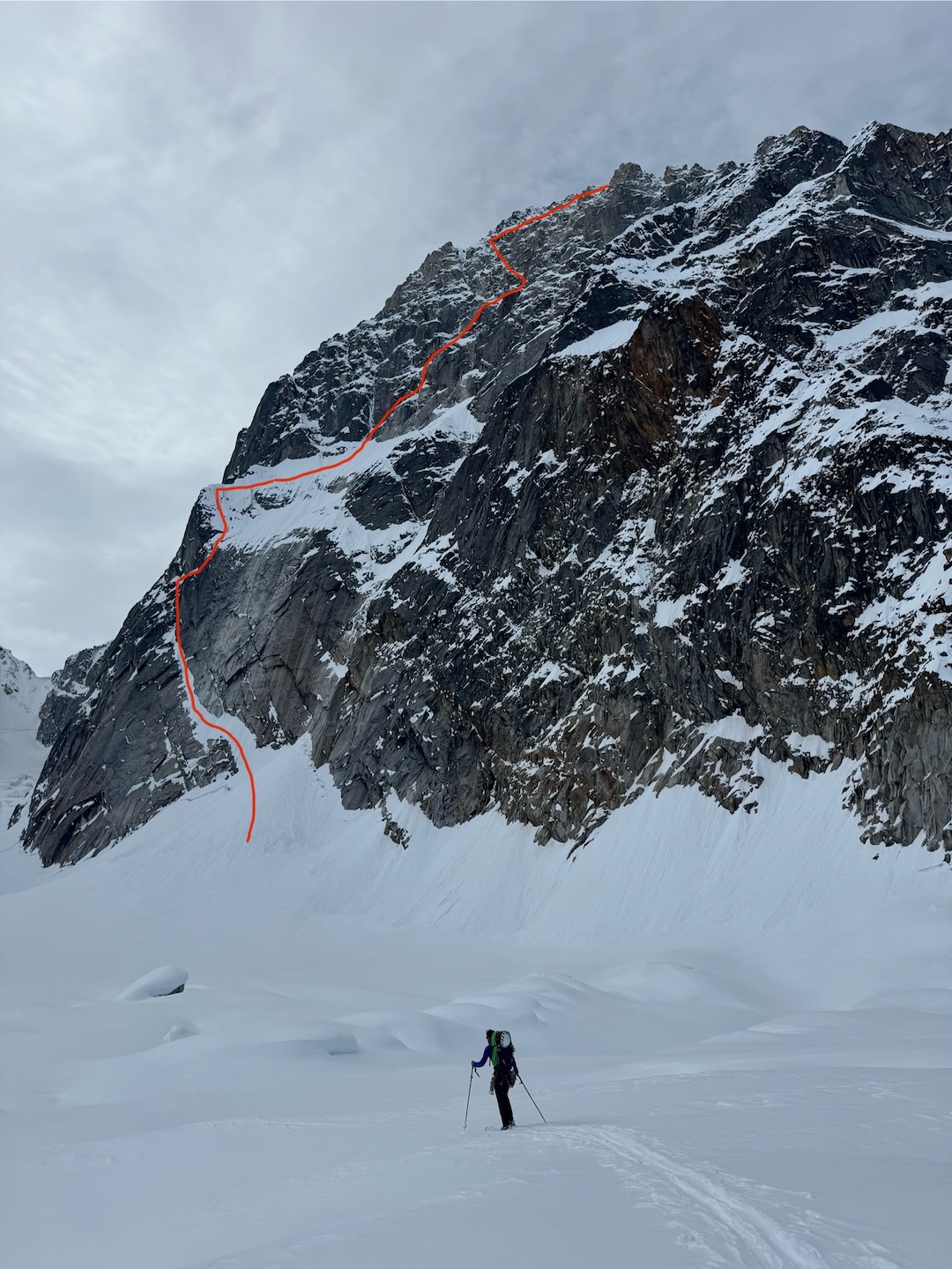 Michael Telstad skinning to the base of the southeast face of Mt. Bradley with the lower part of the line, shared with Vitalogy (Allen-Zimmerman, 2010), marked.