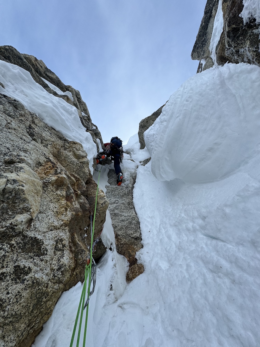 Michael Telstad skirting a snow mushroom on day three on Sports, the new route on the southeast face of Mt. Bradley.