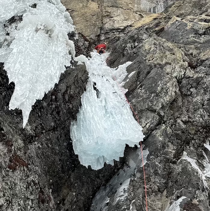 Ethan Berkeland on the Dangler, the WI6 M7 crux pitch of Peavine Palace.