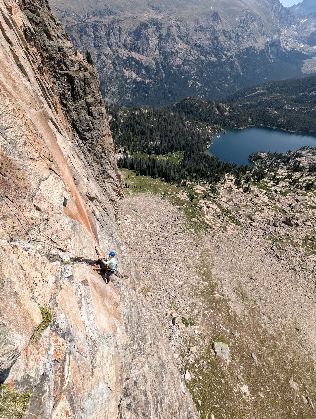Lyle Harte following the right variation of pitch two of Fifth Element (700’, 5 pitches, 5.11- R), Tower 5, Ptarmigan Towers, Rocky Mountain National Park Colorado. 
