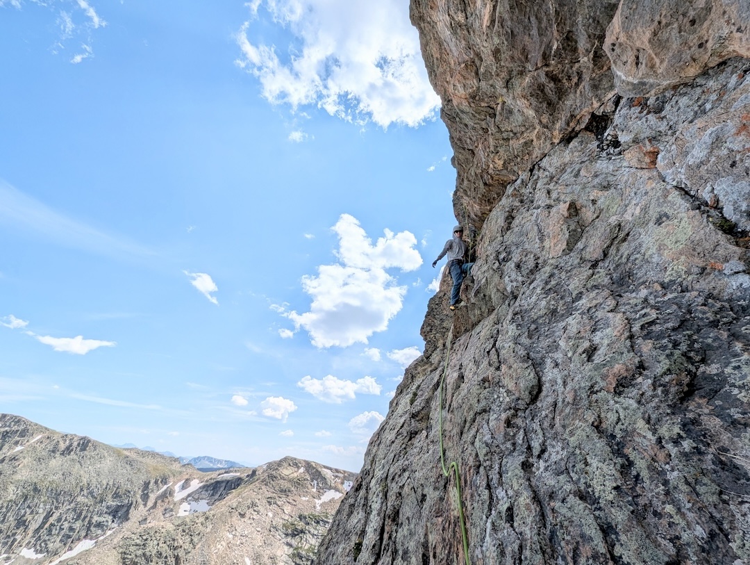 Sam Beane following the final pitch of Fifth Element (700’, 5 pitches, 5.11- R), Tower 5, Ptarmigan Towers, Rocky Mountain National Park Colorado.  