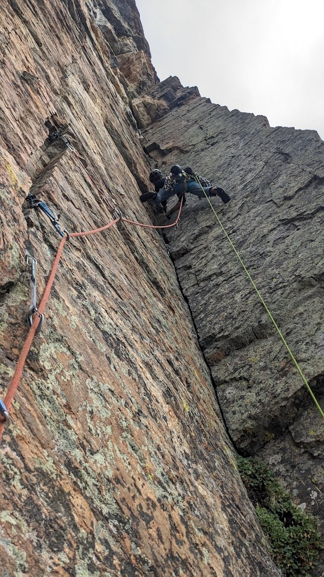 Michael LaDue on the aesthetic 5.10+ corner of pitch five of Rain Dancer (750’, 7 pitches 5.12- PG-13), Tower 1, Ptarmigan Towers, Rocky Mountain National Park, Colorado.  