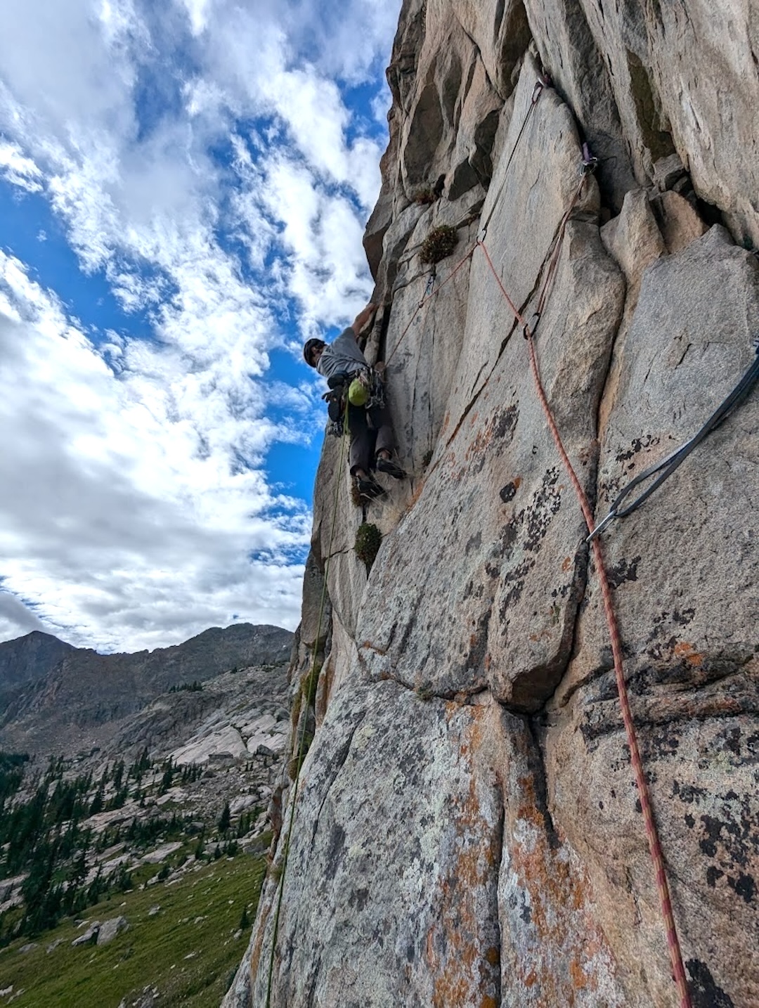 Mike Lane starting up clean granite on the second-pitch traverse of Rain Dancer (750’, 7 pitches 5.12- PG-13), Tower 1, Ptarmigan Towers, Rocky Mountain National Park, Colorado.  