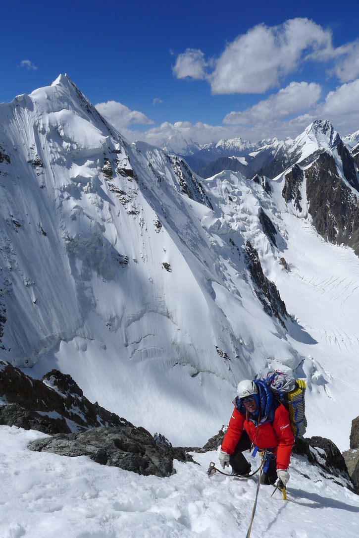 Victor Saunders on the west-northwest face of Yawash Sar I. In back on the left is unclimbed Peak 6,072m. 