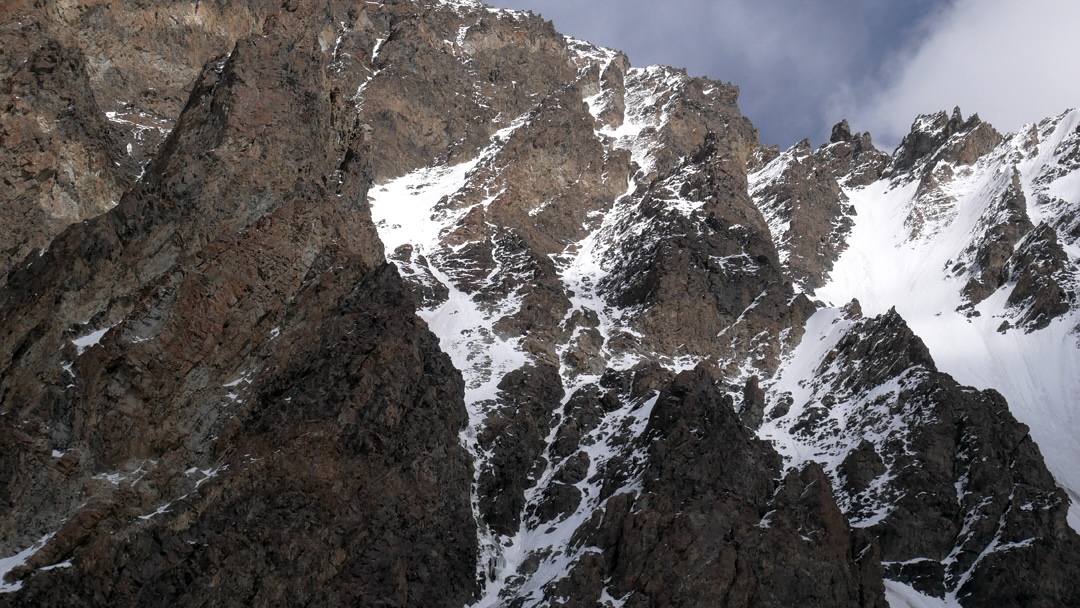 The west-northwest face of Yawash Sar I. The climb followed the central groove system to finish up the southwest ridge. 
