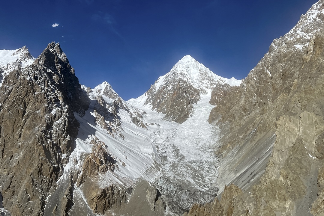 Looking up the Southeast Karun Koh Glacier to Karun Koh (6,977m). The southwest ridge (route of the first ascent) is on the left; the unclimbed east-southeast ridge is on the right.  