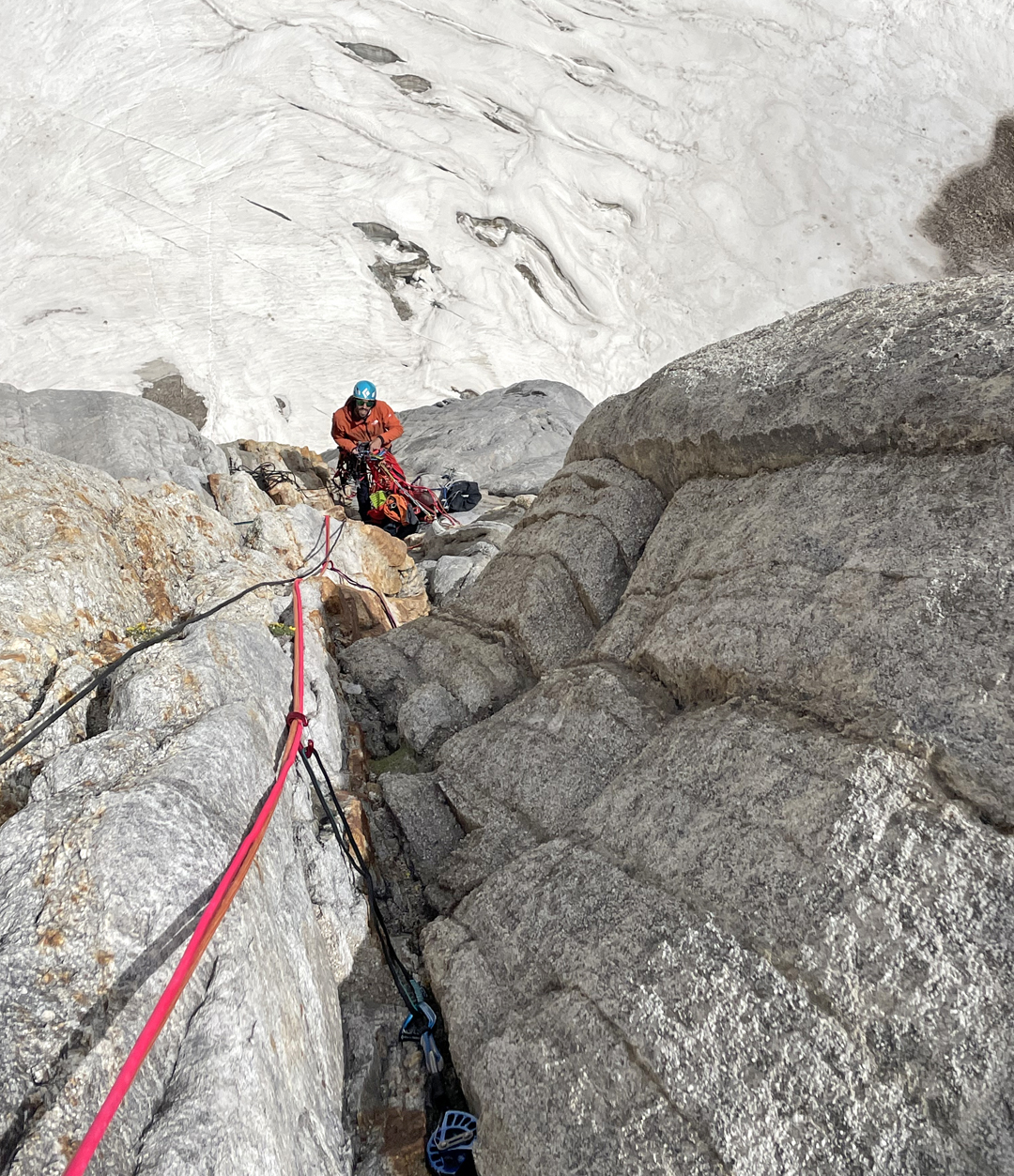 Markel De La Fuente at the belay on pitch ten of the southeast pillar of Sosbun Spire III (Mun Brakk II).  