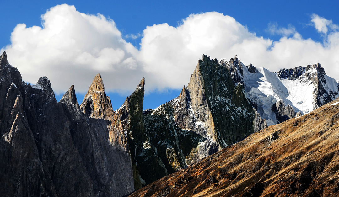 Sokha Brakk (far right) and Sosbun Spires I–VI near the head of the South Sosbun Glacier. Spire I was climbed in 1988, while III was climbed in 2024.