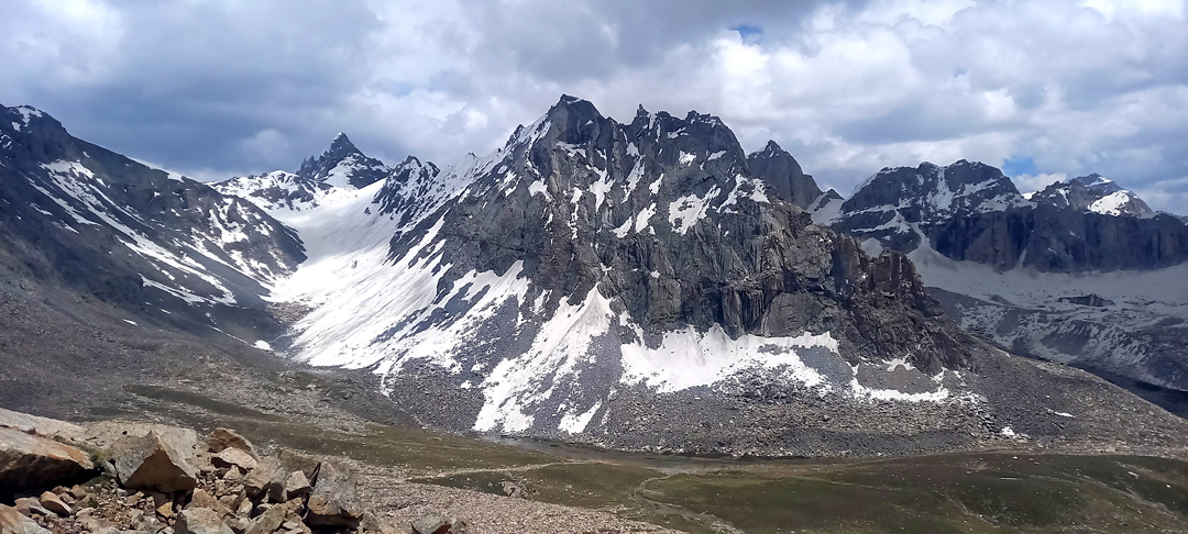 Looking at the northeastern head of the Tanpa Lungma valley. The highest summit in the center is Foo Rey Peak. The distant triangular summit on the left is Peak 36 (5,445m) on the ridge at the head of the valley behind Foo Rey. 