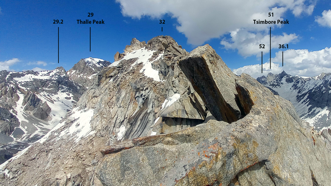 Looking north from above Foo Xho Lake at granite peaks, with the highest in the area, unclimbed Thalle (5,851m), in the distance.  

