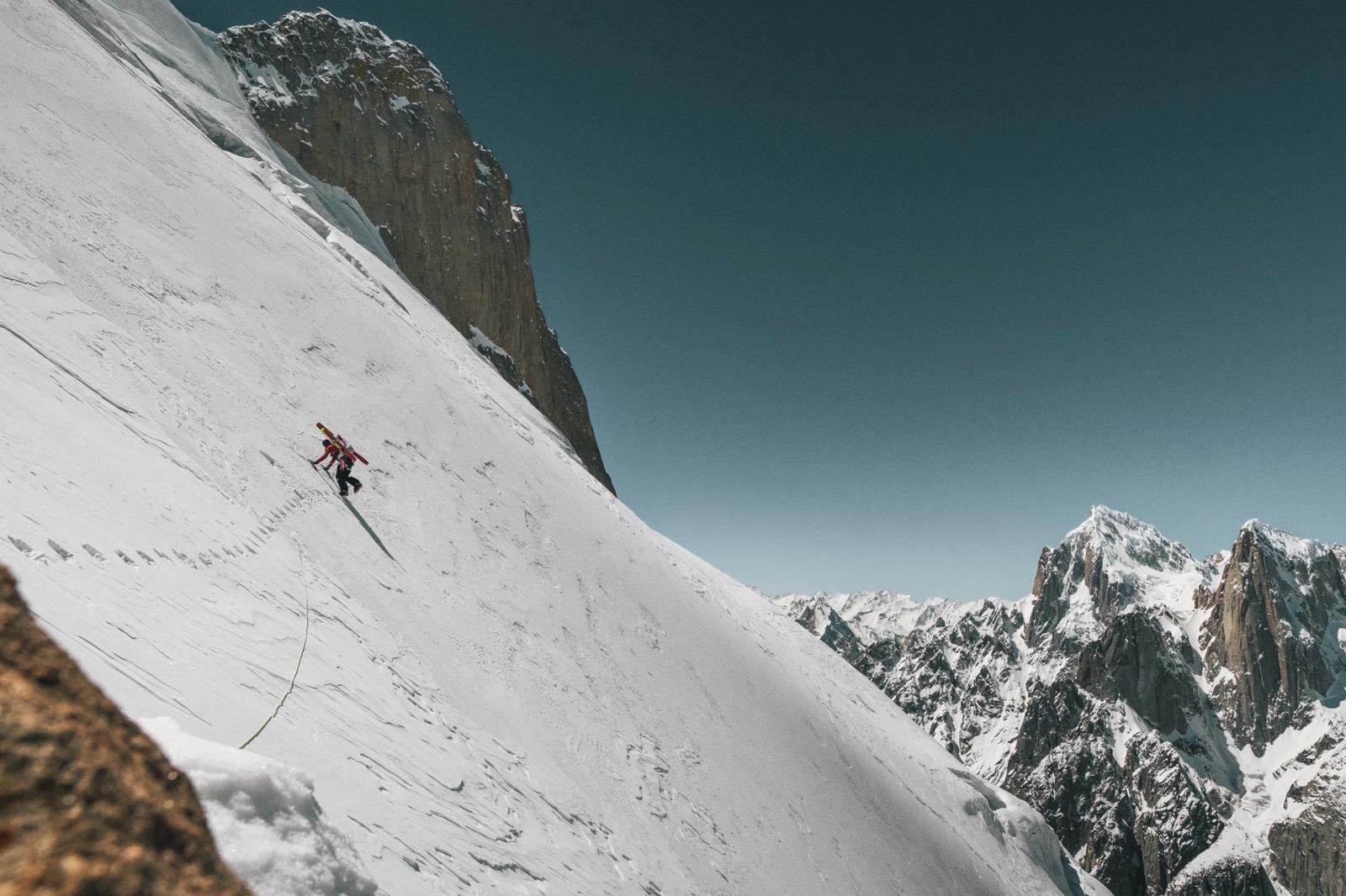 Climbing above high camp on Great Trango Tower. At right are Paiyu Peak and Uli Biaho Tower.