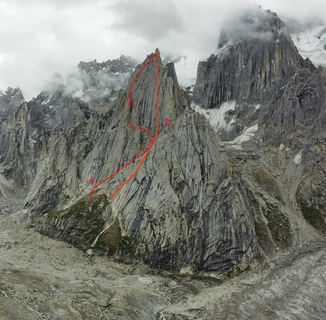 The northwest face of Sckem Brakk (Peak 19) with (1) the approximate line of Asterisk (2021, 5.10 A0, not quite to summit) and (2) Azzardo Estremo (2024, 7a A3).  

