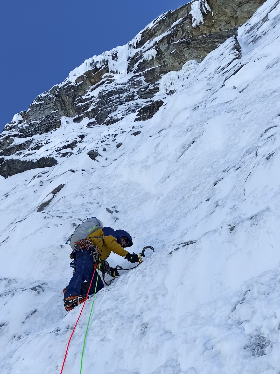 Ice climbing below the bivouac site on the south face of Nevado Copa. 