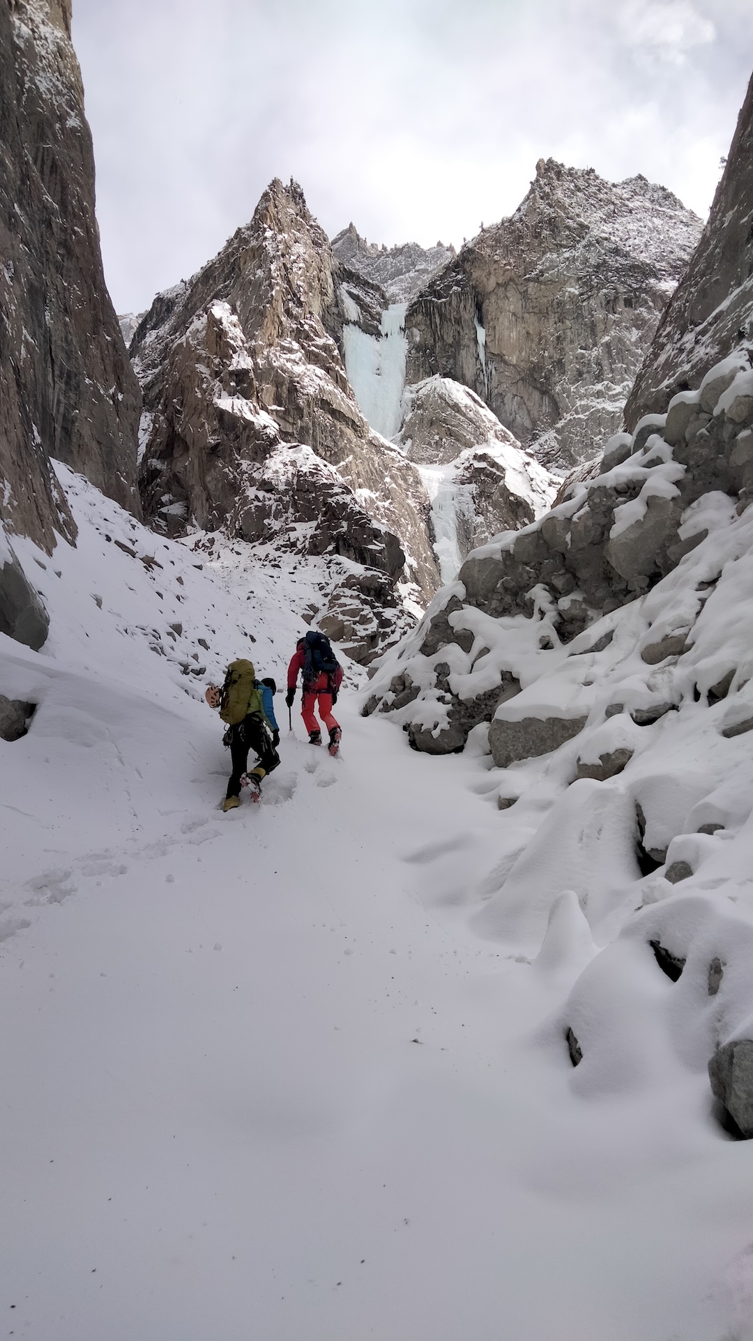 Spanish climbers approaching the Tisar falls near Hushe village. The lower tier was climbed in February 2024. 