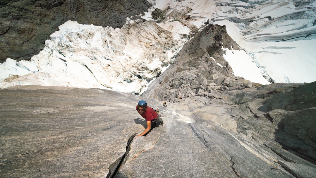 Will Stanhope leading the “endless wide hand and fist crack” called the Incision during the ascent of Smoke and Mirrors (1,371m, ED2 5.12+).