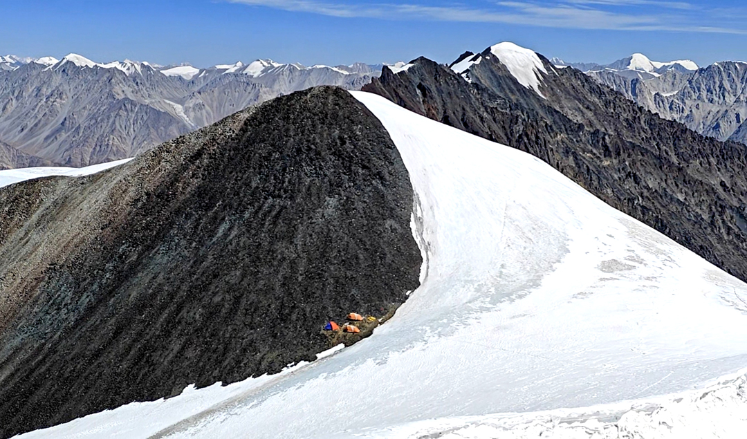 Looking northeast from Peak 6128m at summit camp and, behind, Peak 6,124m. 
