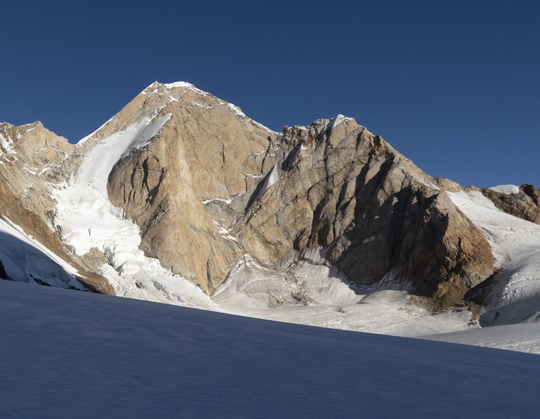The east face of Chiling II (6,253m). The central buttress has not been climbed. The ridge on the right was climbed in 2016 by Oriol Baró and Lluc Pellissa (AAJ 2017). 
