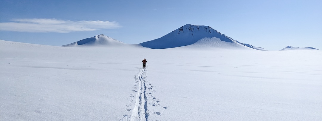 Skiing toward Angilaaq (1,944m), one of two previously climbed peaks the team ascended. 