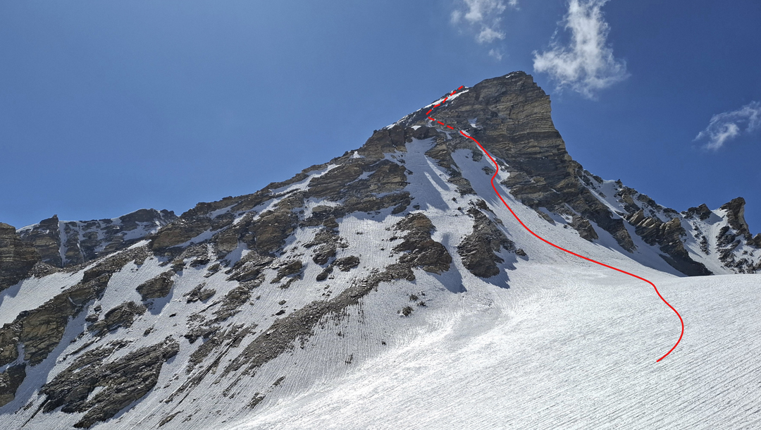 The east face of Antimatterhorn (6,130m) with the line of Charlatan De Balkan. 