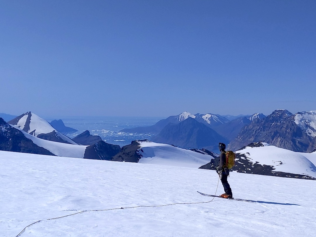 Branden Joy descending Peak 2,171m after the first ascent. On this day, the climbers had their first view of the sea in three weeks.
