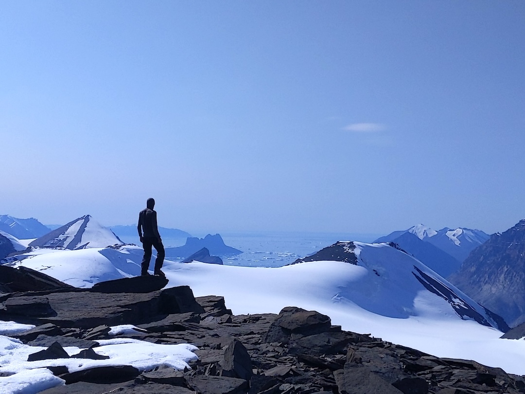 Branden Joy on the summit of Peak 2,063m, Greenland. 